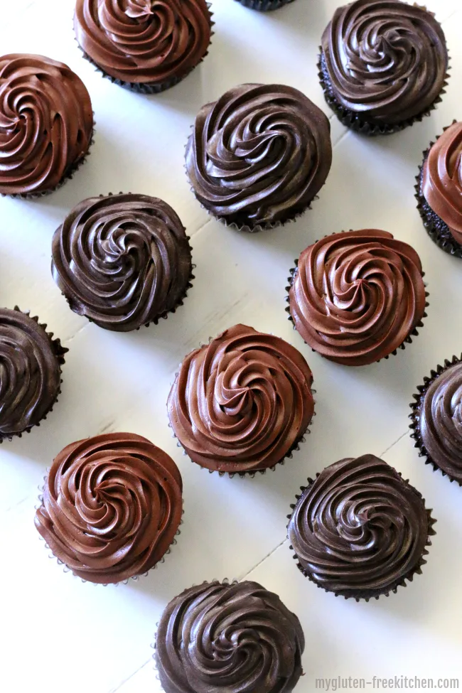 https://mygluten-freekitchen.com/wp-content/uploads/2013/06/Gluten-free-Chocolate-Cupcakes-with-Fudge-Frosting-regular-and-dark-chocolate.jpg.webp