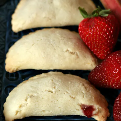 Gluten-free Strawberry Rhubarb Hand Pies. Recipe for a fun portable treat!