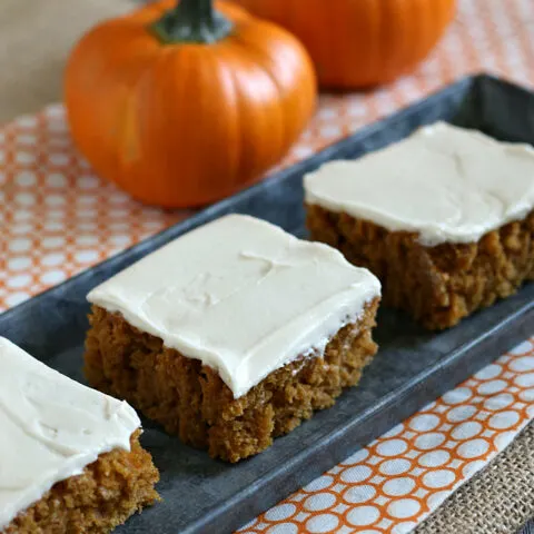 Gluten-free Pumpkin Bars with Cream Cheese Frosting. These cake-like bars are a favorite fall treat. No fork needed!
