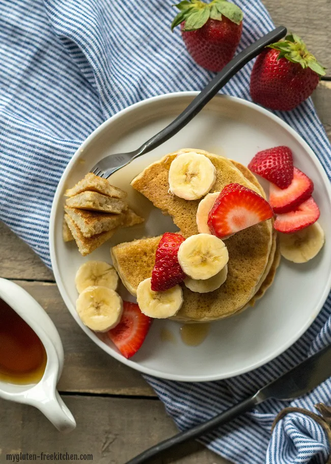 Gluten-free Buttermilk Pancakes with syrup. Delicious gluten-free pancakes that my family loves!