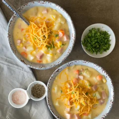 Two bowls of ham chowder