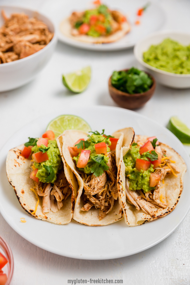 plate with three gluten-free chicken tacos