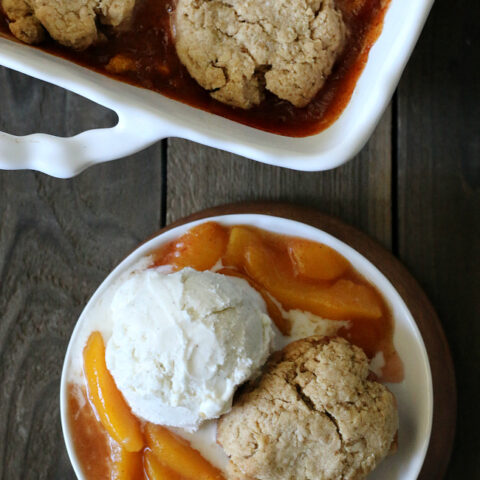 Gluten-free Peach Oatmeal Cookie Crisp. Better than usual fruit crisp because this one is topped with gluten-free oatmeal cookies!
