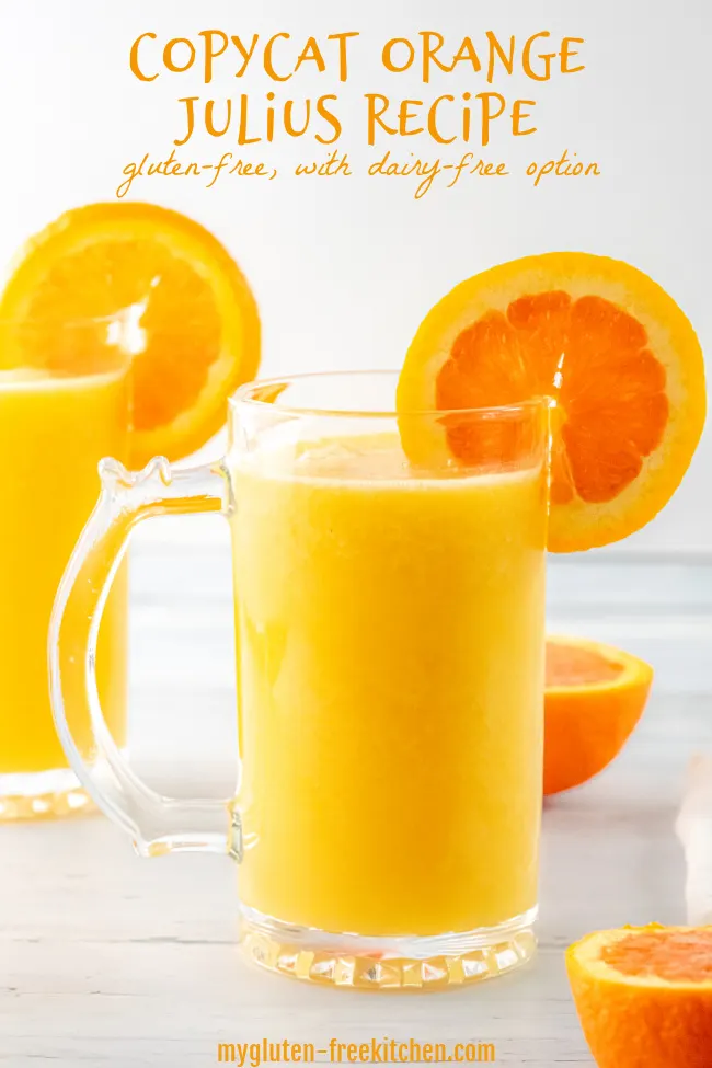 copycat orange julius in glasses with orange slices scattered