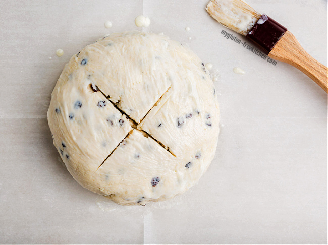 unbaked gluten-free Irish soda bread with a cross cut into it