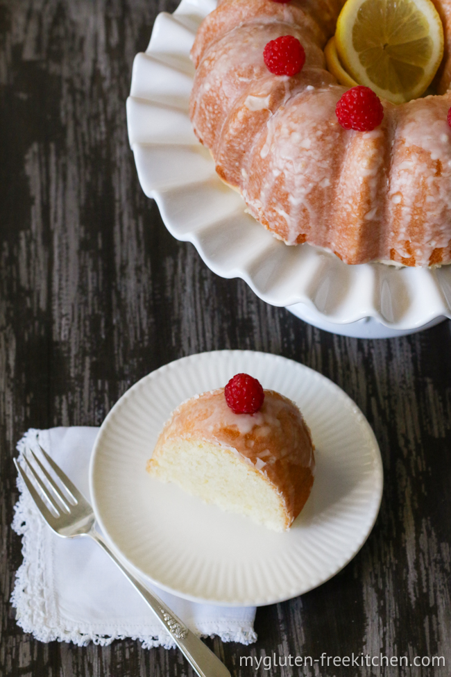 gluten-free dairy-free lemon coconut cake with a cut slice on a plate with a fork