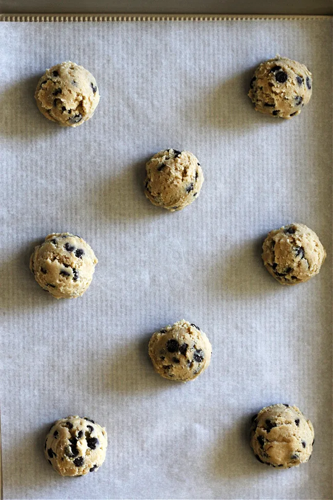 Gluten-free Cookie Dough balls on cookie sheet