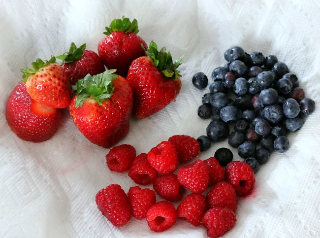 Place washed berries on paper towel to absorb excess water