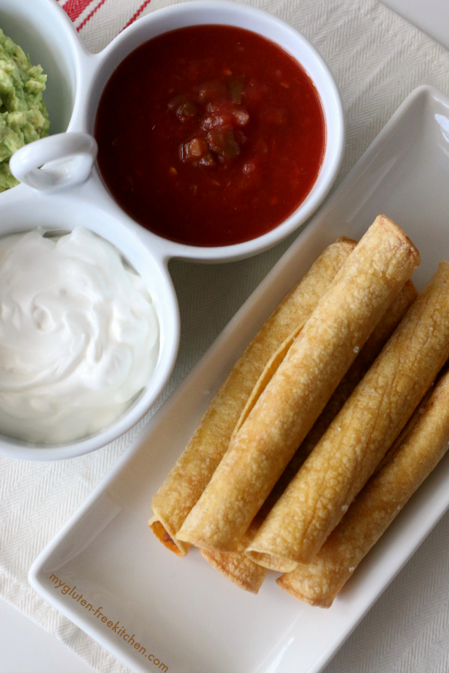 Gluten-free Baked Taquitos. Easy recipe for homemade taquitos for an appetizer or easy dinner.