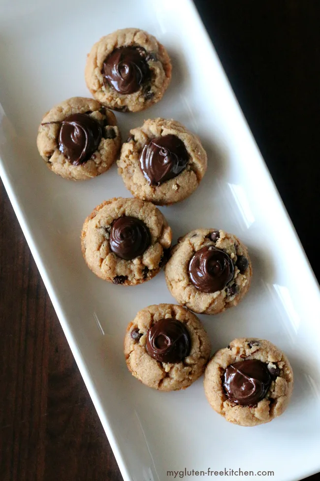 Peanut Butter Chocolate Chip Cookie Cups. Gluten-free and dairy-free recipe! Perfect for cookie trays and gifts!