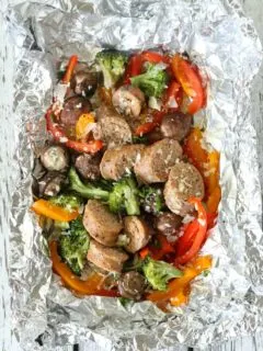Gluten-free Sausage and vegetable grilled foil packet dinner. Easy option to make dairy-free too. My family loved these because everyone could customize theirs!