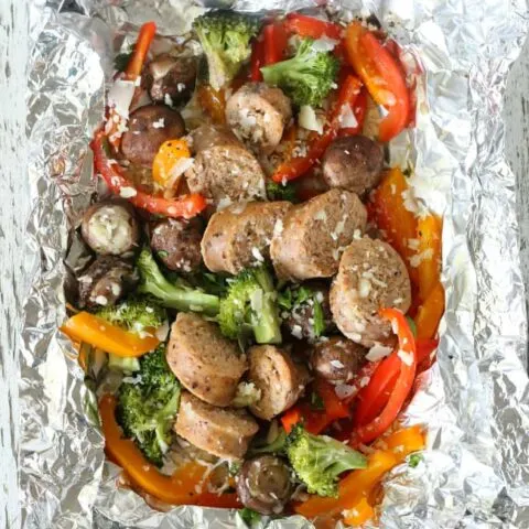 Gluten-free Sausage and vegetable grilled foil packet dinner. Easy option to make dairy-free too. My family loved these because everyone could customize theirs!
