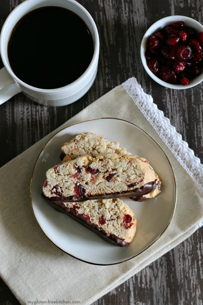 https://mygluten-freekitchen.com/wp-content/uploads/2017/12/Chocolate-Dipped-Gluten-free-Almond-Cranberry-Biscotti-.jpg.webp