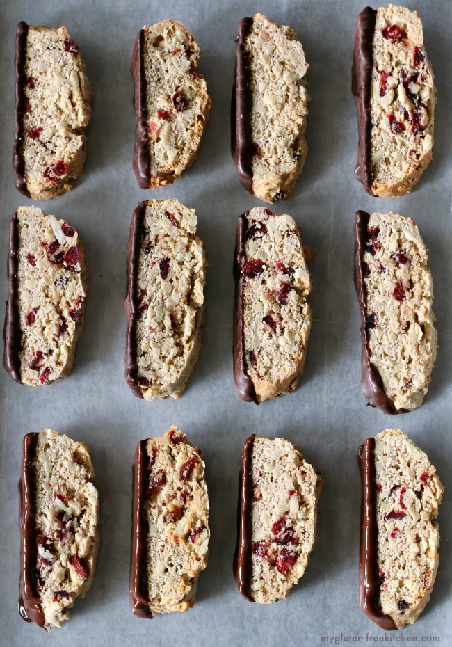 Gluten-free Almond Biscotti sliced on baking sheet