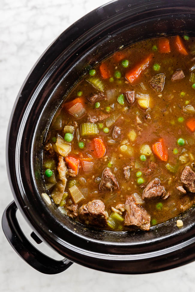 Gluten-free beef stew in clay pot. Gluten-free dinner cooked over low heat that