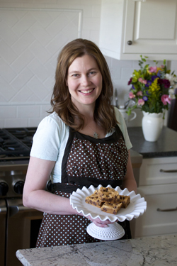 photo of Michelle holding peanut butter brownies on a plate