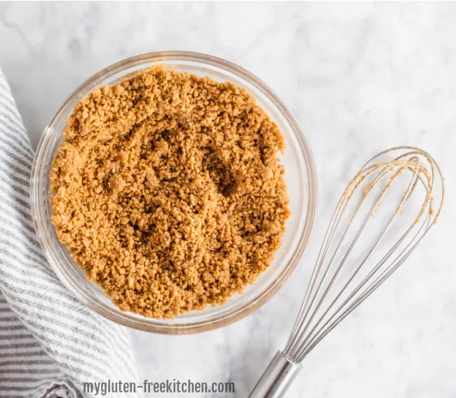 gluten-free graham cracker crust mixture in bowl