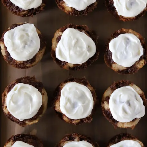 12 gluten-free cinnamon muffins with cream cheese frosting