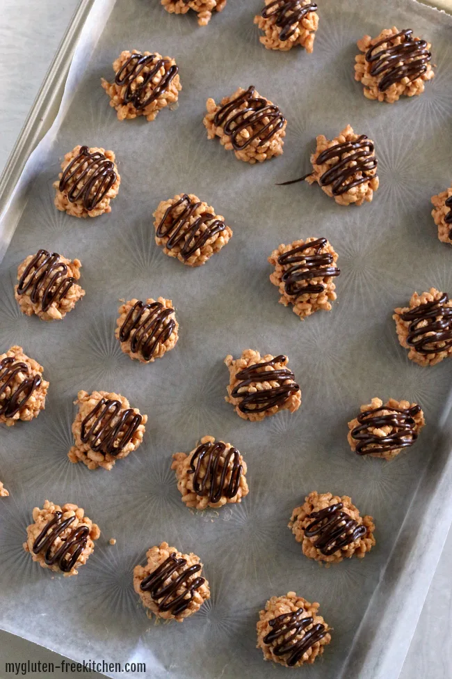 Pan of Gluten-free no bake treats with drizzled chocolate
