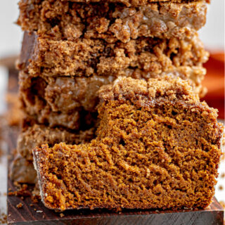 Sliced gluten-free pumpkin bread with bite
